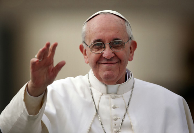 VATICAN CITY, VATICAN - MARCH 27:  Pope Francis waves to the crowd as he drives around St Peter's Square ahead of his first weekly general audience as pope on March 27, 2013 in Vatican City, Vatican. Pope Francis held his weekly general audience in St Peter's Square today  (Photo by Christopher Furlong/Getty Images)