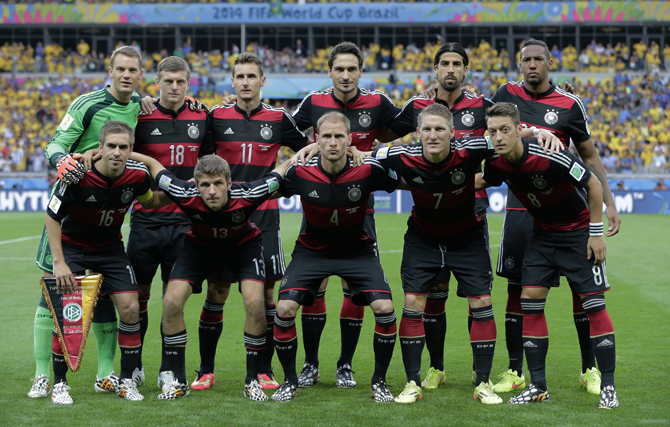 The German team pose for a group photo before the World Cup semifinal soccer match between Brazil and Germany at the Mineirao Stadium in Belo Horizonte, Brazil, Tuesday, July 8, 2014. (AP Photo/Matthias Schrader)